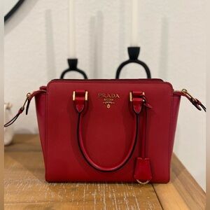 Red Prada like new wore two times serious offers only
